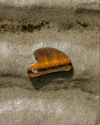 Tiger’s Eye gua sha facial massage tool for sculpting and skincare