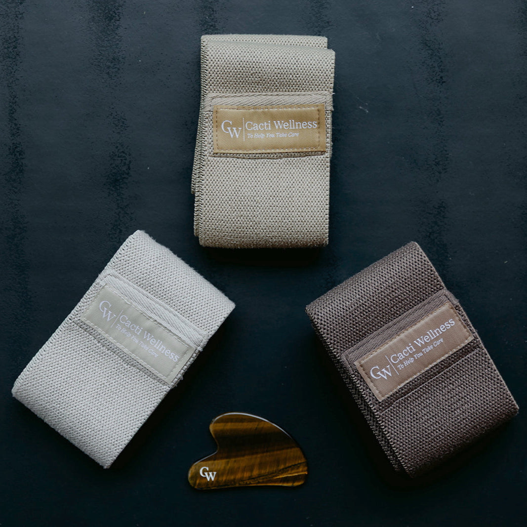 The Sculpt Bundle by Cacti Wellness including the Tiger's Eye Gua Sha and 3-Pack of Neutral Resistance Bands