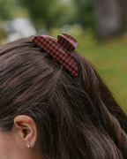 The Clip in Cinnamon gingham on a picnic basket