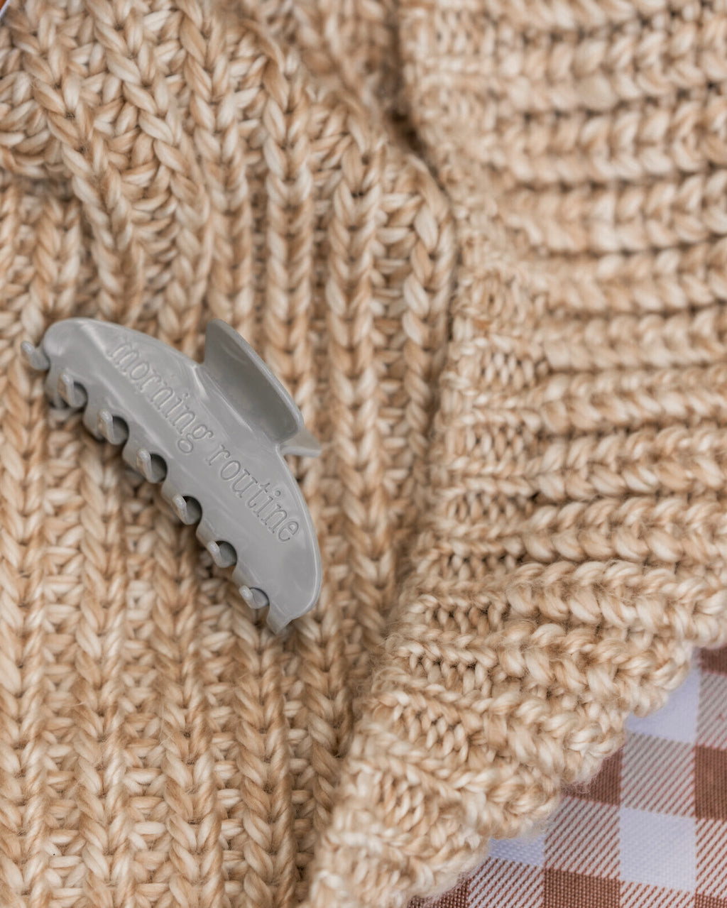 The Clip in Foggy Morning on a brown blanket